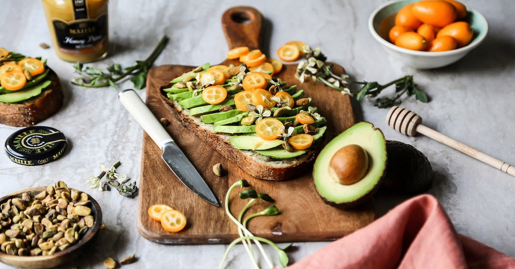 Maille Avocado Kumquat Tartine with Maille Honey Dijon & Pistachios