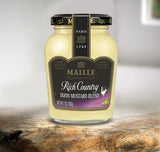 Maille Rich Country Dijon Mustard, 7oz on table